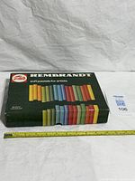 Closed box of Talens Rembrandt soft pastels with tape measure