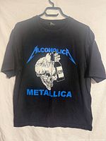 Front view showing Alcoholica Metallica blue graphic