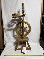 Full view of spinning wheel showing overall design