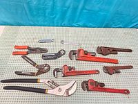 All hand tools laid out to show variety and condition