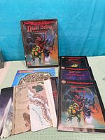 Overall lot showing box, three books, several folded maps