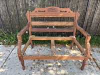 full front view of wooden settee frame