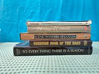 Stacked view of all five book spines
