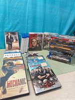 Overall view showing NCIS box sets, movie cases, blank cases