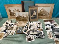 Overview of entire lot: loose photos, mounted prints, two albums