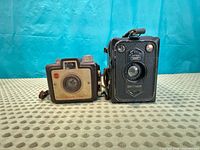 Front view of both cameras showing identifying markings