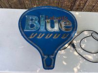 Front view of Labatt’s Blue light-up sign with cord
