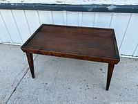 Full view of rectangular wooden coffee table