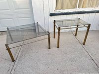 Both tables side by side outside building