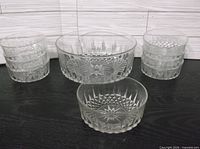 All eight Arcoroc Diamond Starburst bowls grouped: six small stacked, medium and large bowls visible