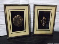 Both framed pieces standing side by side showing size and style