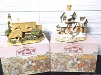 Both David Winter cottages on their original boxes