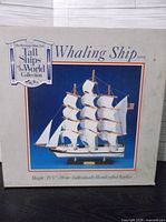 Front of original box showing brand, collection name and product image