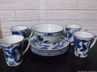 Full set showing mugs, bowls, plates