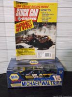 Magazine and boxed die-cast car together