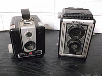 Kodak Brownie Hawkeye and Spartus Full-Vue cameras front view