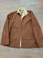 Full view front of brown suede jacket