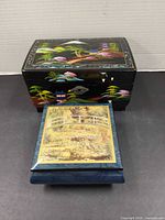 Both musical jewelry boxes closed