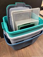 Nested stack showing three totes, lids inserted