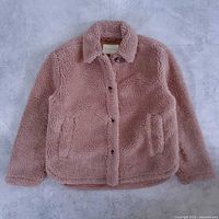 Front view of camel faux fur sherpa jacket