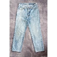 Full front view of stonewash blue Edwin jeans showing overall condition and fade pattern