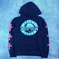 Front view of black hoodie with Guns N’ Roses circular logo and sleeve graphics visible