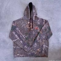Front view of Realtree woodland camo pullover hoodie