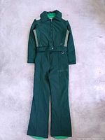Full snowsuit laid flat showing jacket over pants