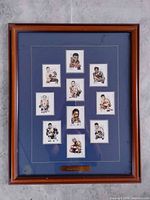 Full view of framed boxing card display