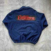 Back of jacket showing Canterbury patch and elastic hem