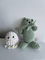 Front view of both crocheted animals
