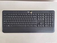 Top view of Logitech K540 keyboard with USB receiver