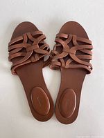 Top view of both sandals showing strappy design and condition