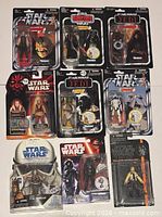 Front view of nine carded Star Wars figures