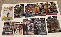 Front view of all ten sealed G.I. Joe items