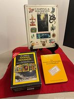 Boxed National Geographic set, Camping & Wilderness Survival book, Worst-Case Scenario book