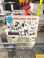 Front of Topps #197 card on stand