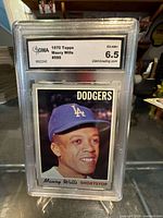 Front view of GMA-slabbed 1970 Topps Maury Wills card showing grade label 6.5