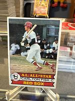 Front view of the Carlton Fisk Topps card on stand