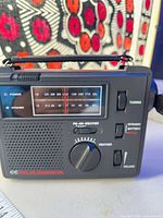 Front view showing display, controls and speaker grille