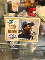 Front of 1974 Topps Hank Aaron card on stand
