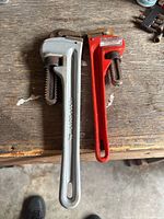 Overall view of both pipe wrenches on workbench