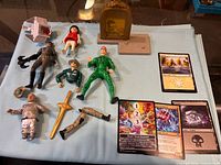 Overall lot showing figures, accessories and cards