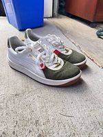 Pair of Puma GV Special SE sneakers side view showing colourway and condition