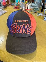 Front view showing Phoenix Suns embroidery and color blocking