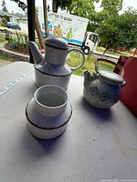 Overview of all three stoneware pieces on table