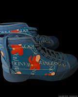 Side view showing elephant motif and JW ANDERSON text