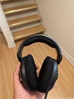 Front view of entire headphones showing earcups and cable