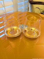 Two LSA double-walled clear tumblers on table