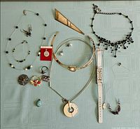 Overview of entire jewelry lot on table